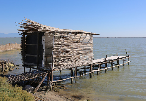 Fisherman Hut on Wooden Pier by The Mediterranean Sea in Yumurtalik, Adana, Turkey
