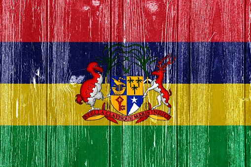 Flag and coat of arms of Republic of Mauritius on a textured background. Concept collage.