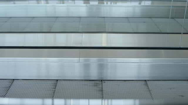Horizontal escalator in airport for faster traveling