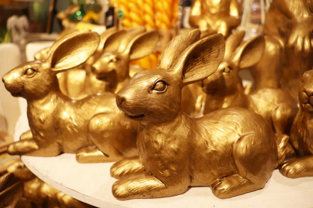 colorful figurines of Easter bunnies on a store window