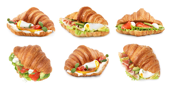 Delicious croissants with different fillings isolated on white, set