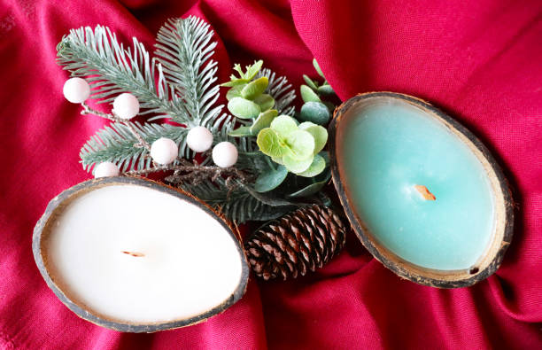 istock original candles in coconut and fir branch 1893120139