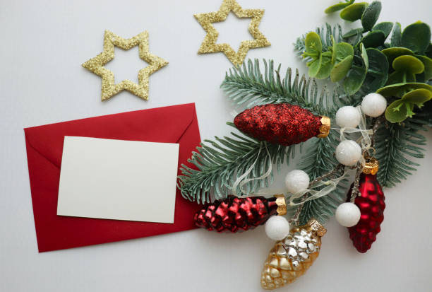 istock fir branch with New Year's toys and white blank for text 1893129905