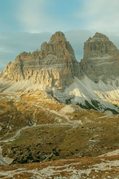 Raised view of rugged mountains at sunset