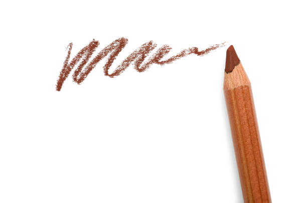 Brown pastel pencil and scribble isolated on white, top view. Drawing supply
