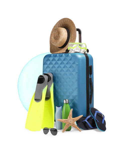 istock Suitcase, inflatable ring and other beach accessories isolated on white 1893258380