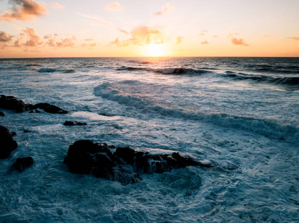 Aerial drone footage from the coast of the Pacific Northwest, featuring Oregons beautiful rugged terrain and blue ocean waves.  Captured in Depoe Bay, Oregon state,  USA.