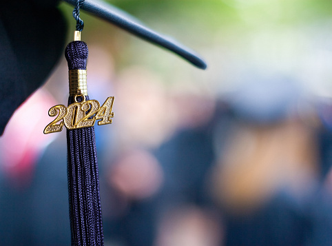Closeup of a 2024 Graduation Tassel at a graduation ceremony.