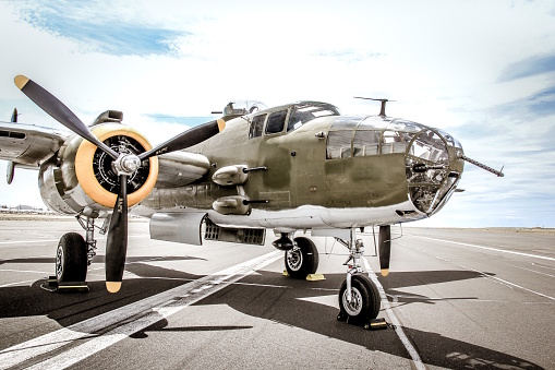 The photo shows a WWII medium bomber produced by North American Aviation (NAA).  This particular North American B-25J Mitchell is nicknamed, 