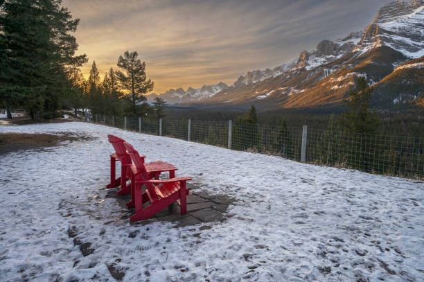 istock Red Chairs Facing Mount Rundle in Banff National Park 1893365175