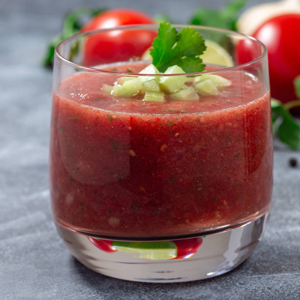 istock Soup Gazpacho served in glass garnished with cucumber and cilantro, square format 1893370843