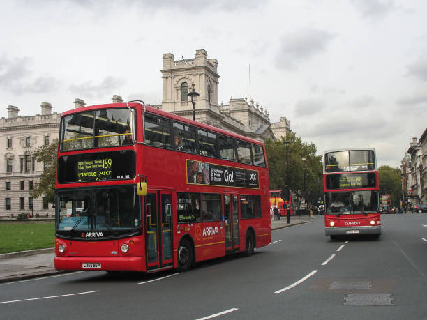 London, United Kingdom - 10 November, 2006: Volvo B7TL/Alexander Dennis ALX400 double-decker buses on a street. The double-decker buses are the ones of the most attractive objects for tourists in London city.