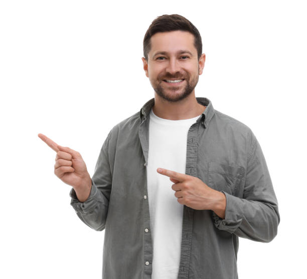istock Special promotion. Smiling man pointing at something on white background 1893371276