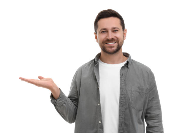 istock Special promotion. Smiling man holding something on white background 1893379185