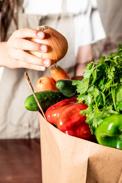 buying fresh vegetables with different currencies