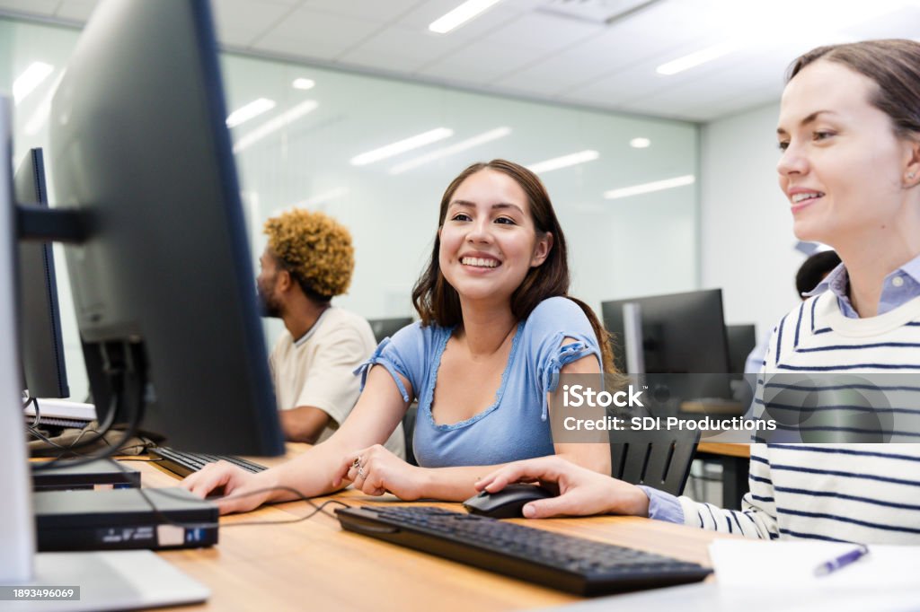 Calices From Computer Work Female University Students Work On Computer Homework Stock Photo ...