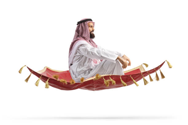 istock man sitting on a magic carpet and flying 1893496988