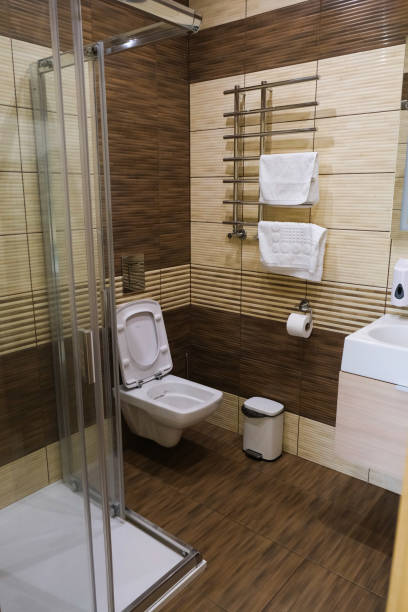 istock Shared shower room and toilet in the hotel. Modern design. 1893498823