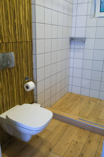 istock Shared shower room and toilet in the hotel. Modern design. 1893498830