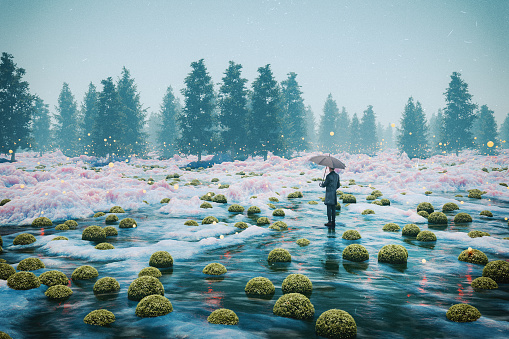 Man with umbrella standing in fantasy landscape. 3D generated image.