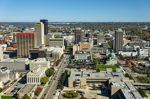 Aerial still of downtown Dayton, Ohio on a clear day in Fall.