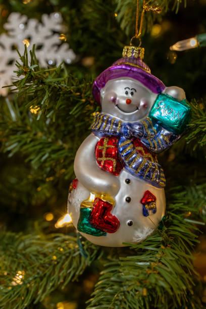 istock Colorful snowman Christmas tree ornament 1893643052