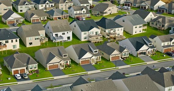 Aerial shot of tract housing in Emmaus, a borough in Lehigh County, Pennsylvania, on an overcast day in Fall.