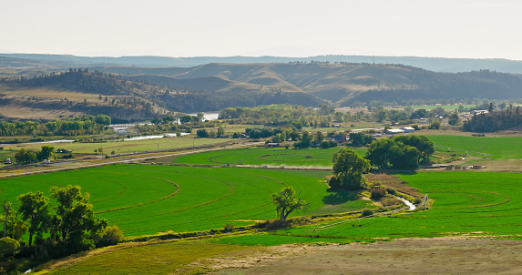 Aerial view of rural scenery outside of Billings in Stillwater County, Montana, near the small town of Park City, on a clear day in Fall.