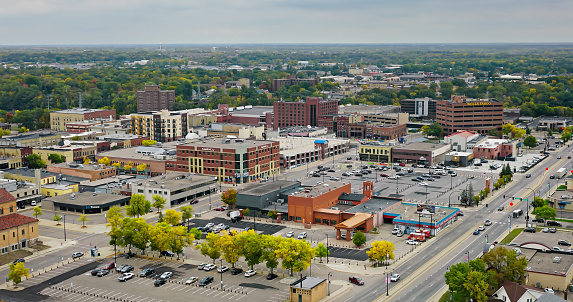 Aerial view of downtown Saint Cloud, a city in Minnesota, on an overcast day in Fall.