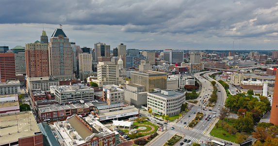 Aerial establishing shot of Baltimore, Maryland on an overcast day in Fall.