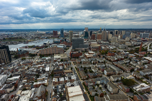 Aerial establishing shot of Baltimore, Maryland on an overcast day in Fall.