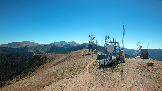 Microwave and cell tower equipment on top of Monarch Pass mountain top after riding tramway in the Rocky Mountains near Gunnison Colorado United States