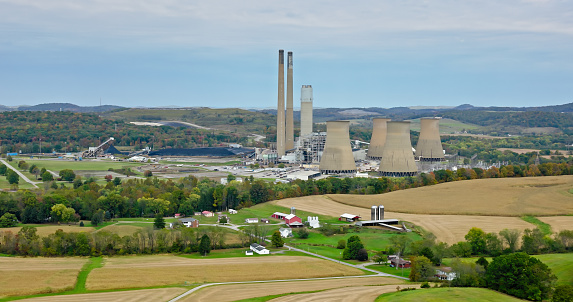 Aerial still of Keystone Generating Station, a coal power plant west of Shelocta, Pennsylvania, on an overcast day in Fall.