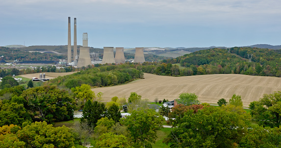 Aerial still of Keystone Generating Station, a coal power plant west of Shelocta, Pennsylvania, on an overcast day in Fall.