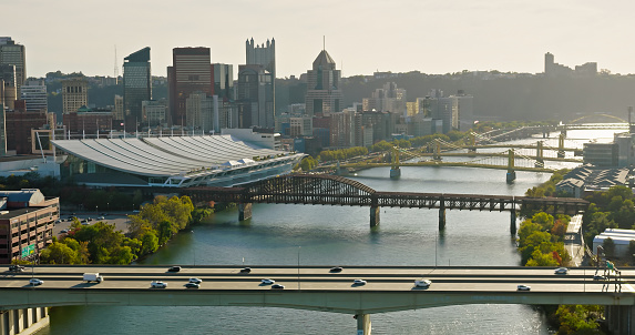 Aerial shot of downtown Pittsburgh, Pennsylvania from over Allegheny River in Fall.