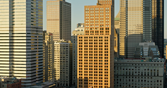 Aerial shot of buildings in downtown Pittsburgh, Pennsylvania on a clear day in Fall.