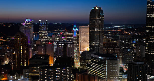istock Illuminated Downtown Pittsburgh, Pennsylvania on a Fall Evening - Aerial 1893811593
