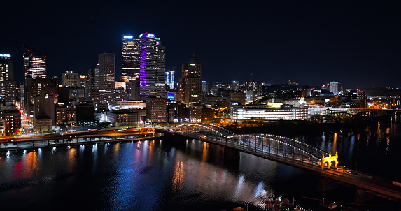 Aerial shot of downtown Pittsburgh, Pennsylvania with Smithfield Bridge and Monongahela River on a Fall night.