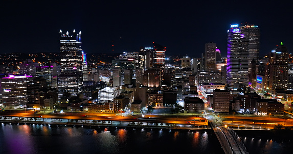 Aerial shot of downtown Pittsburgh, Pennsylvania with Smithfield Bridge and Monongahela River on a Fall night.