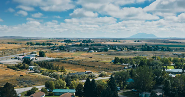 istock Fluffy White Clouds Over Farmland in Idaho 1893818990
