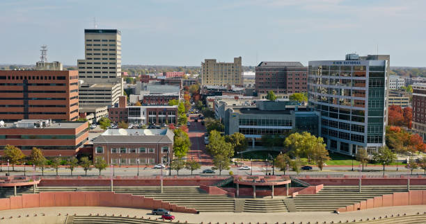 aerial shot of evansville levee and downtown streets from over ohio river - ohio river valley stock-fotos und bilder