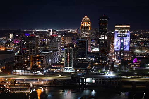 Aerial shot of downtown Louisville, Kentucky from over Ohio River on a Fall night.

Authorization was obtained from the FAA for this operation in restricted airspace.