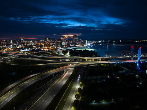 Aerial shot of downtown Louisville, Kentucky and Interstate highways on a Fall evening.

Authorization was obtained from the FAA for this operation in restricted airspace.