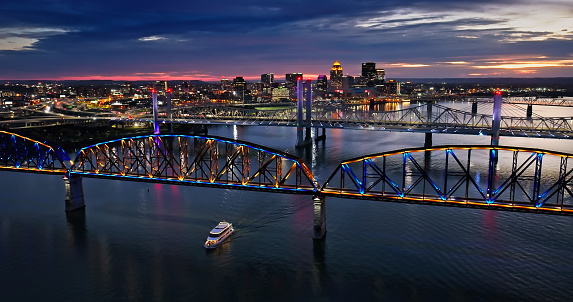 Aerial shot of downtown Louisville, Kentucky from over Ohio River on a Fall evening.

Authorization was obtained from the FAA for this operation in restricted airspace.