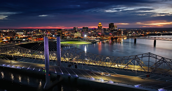 Aerial shot of downtown Louisville, Kentucky and Ohio River on a Fall evening.

Authorization was obtained from the FAA for this operation in restricted airspace.