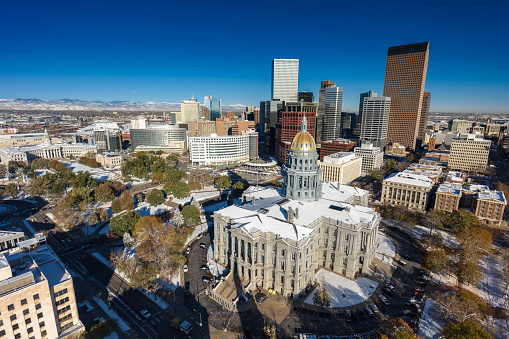 Aerial shot of the Colorado State Capitol building in Denver on a cold and clear morning in late Fall.