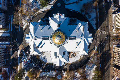 Aerial shot of the Colorado State Capitol building in Denver on a cold and clear morning in late Fall.