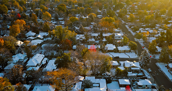 Aerial shot of snowcapped houses in Cheesman Park, Denver on a cold and clear morning in late Fall.