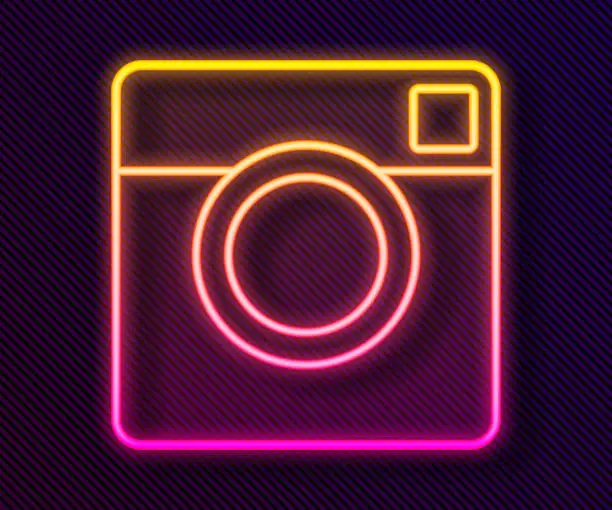 Vector illustration of Glowing neon line Photo camera icon isolated on black background. Foto camera. Digital photography. Vector