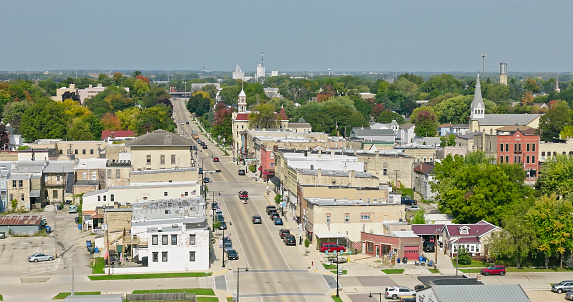Aerial view of Columbus, a small city in Columbia County and Dodge County, in the south-central part of the U.S. state of Wisconsin, on a clear day in Fall.